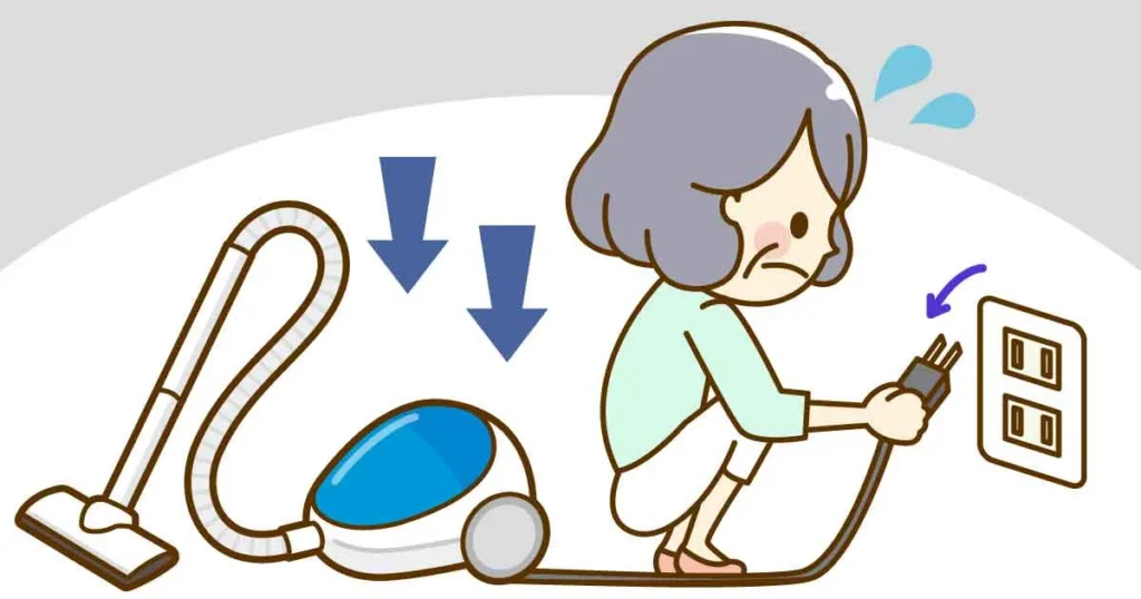 コード付き掃除機のコードをかがんでプラグから抜いている高齢女性のイラスト