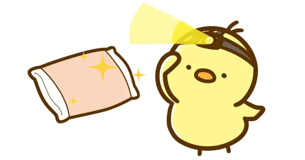 ひよこが輝く枕を探しているイラスト